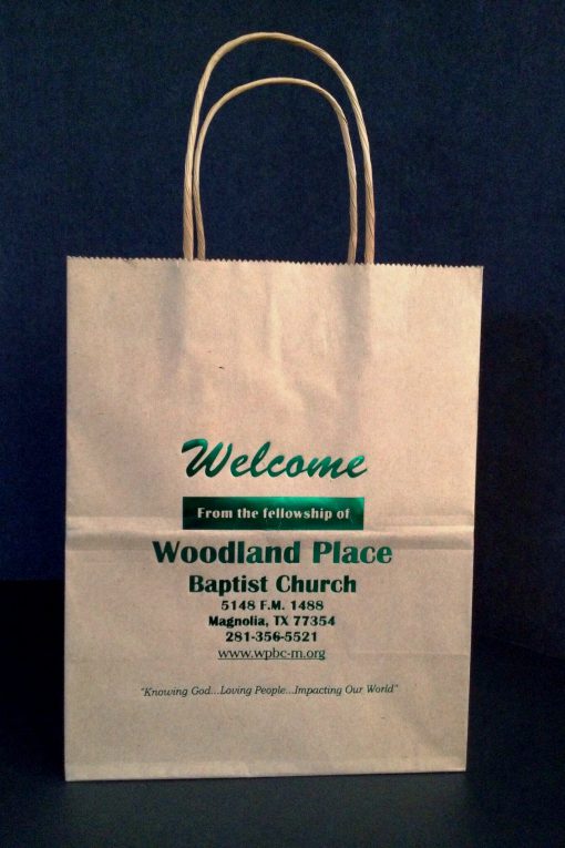 Welcome Woodland Place Baptist church - tan kraft paper shopper hot stamped met. green