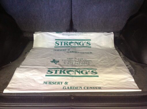 Strong's Nursery - trunk liners white film w/green ink